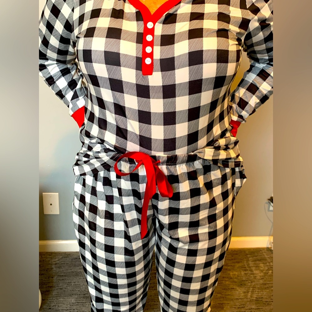 Womens buffalo plaid with red trim pajamas.